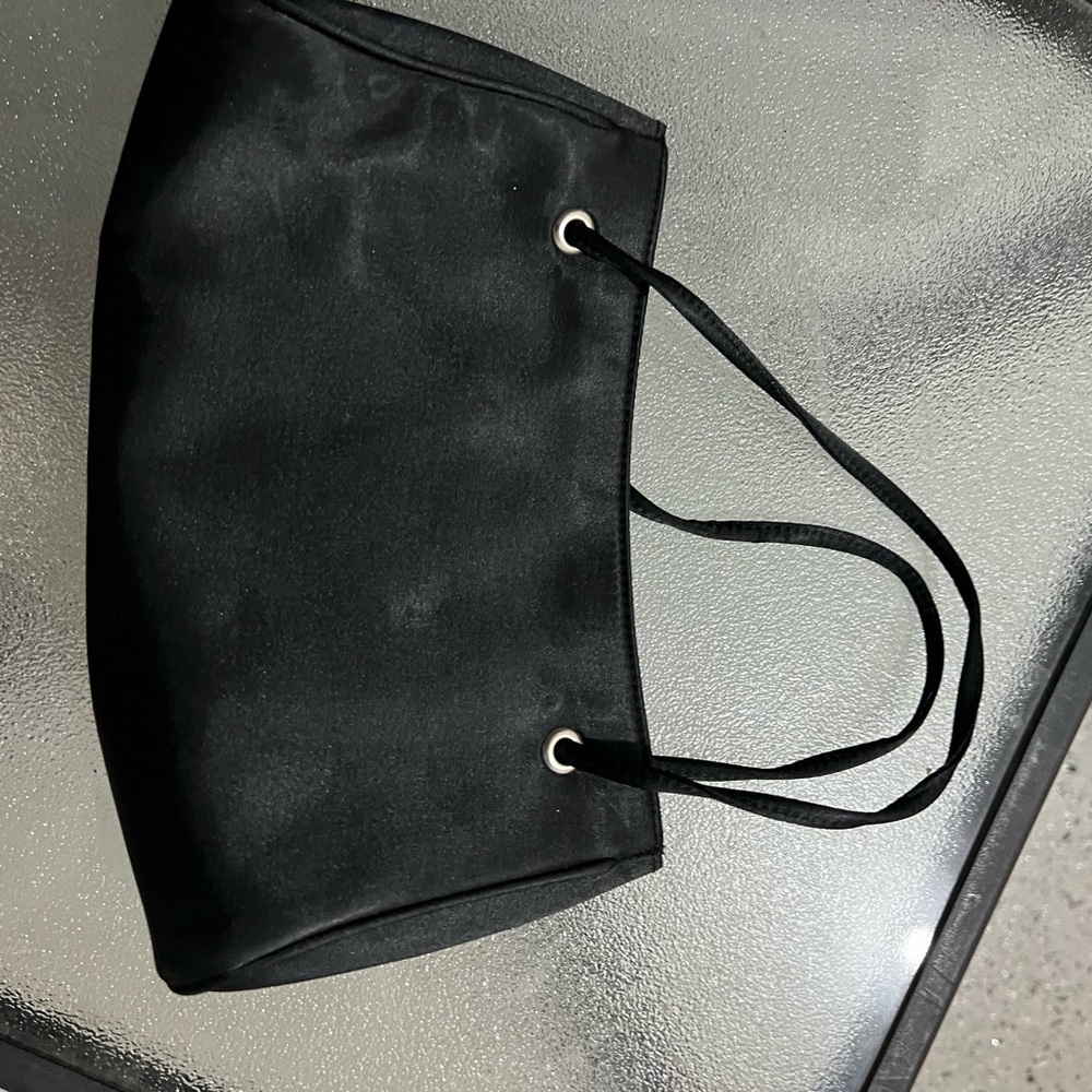 La Regale black satin shoulder bag with silver hardware